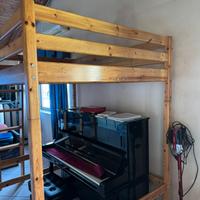 Letto a una piazza e mezza rialzato in legno