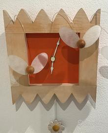 Orologio in legno da parete