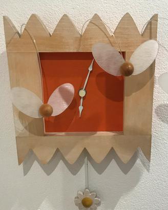 Orologio in legno da parete