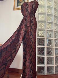 Tuta jumpsuit elegante e luminosa Oltre