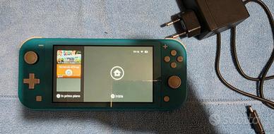 Nintendo Switch Lite azzurra con caricabatterie