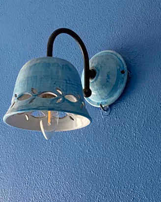 Lampada  da parete in ferro battuto