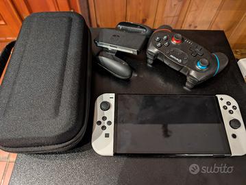 Nintendo Switch OLED + 8 giochi + accessori