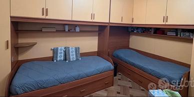 Letti con cassettoni completi di materassi