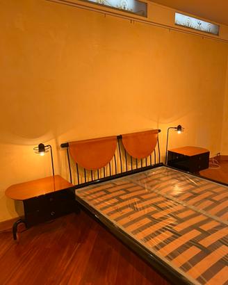 Letto con comodini incorporati