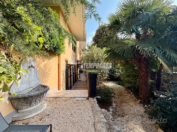 QUADRILOCALE SU DUE LIVELLI CON GIARDINO - USMATE