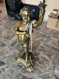 Putto grande con candelabro