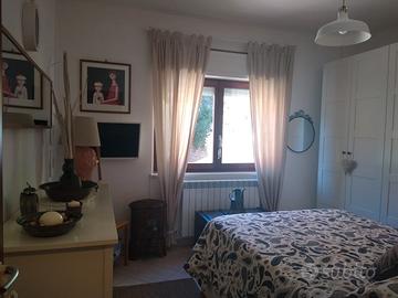 Bilocale arredato con posto auto privato