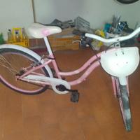 Bicicletta bianca e rosa