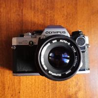 Olympus OM 10+ Obiettivo ZUIKO+ Batterie