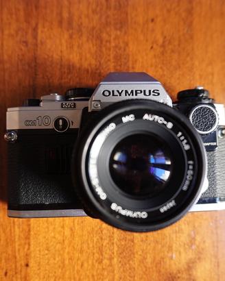 Olympus OM 10+ Obiettivo ZUIKO+ Batterie