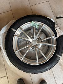 4 cerchi originali audi e 4 gomme invernali