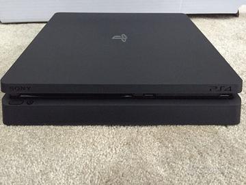 PS4 Slim 1tb +base raffreddamento +giochi