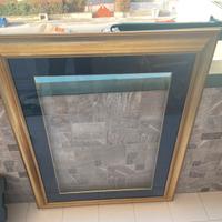 Cornice dorata con passpartout blu velluto