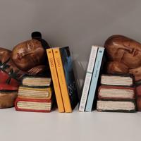 Statuine di legno fermalibri