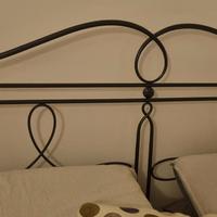 Letto contenitore matrimoniale in ferro battuto