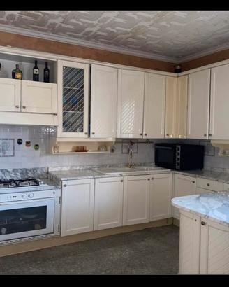 Cucina Fiamberti e tavolo in marmo di Carrara