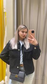 giacca nera in materiale