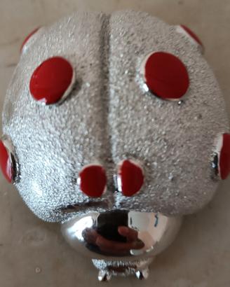 Coccinella ricoperta d argento 