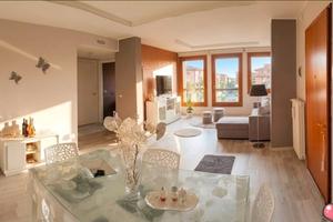 Elegante bilocale moderno con posto auto privato