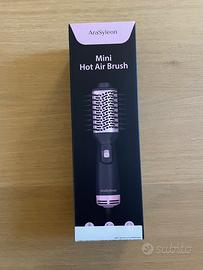 Spazzola asciugacapelli ad aria calda