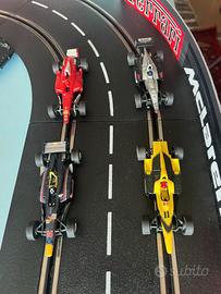 Lotto unico 4 slot Scala 1/43 carrera Go F1