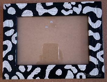 Cornice leopardata dipinta a mano
