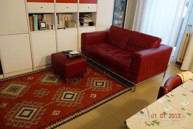 Divano biposto in pelle bordeaux