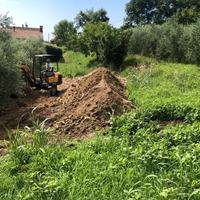 terra con sassi per sotto fondo stradale o altro
