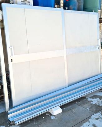 porta scorrevole a doppio battente usata