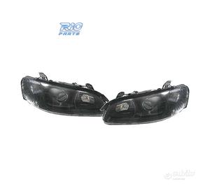 FARI PER OPEL OMEGA 94-99 LENTE A LENTE NERA