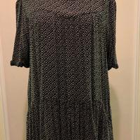 Vestito ampio con tasche