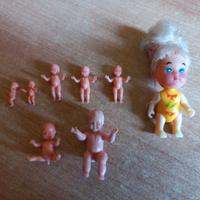 8 bambole baby,mini,bebè. 6 sono sorprese Kinder