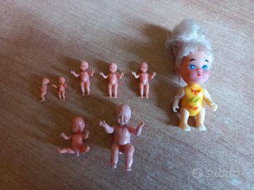 8 bambole baby,mini,bebè. 6 sono sorprese Kinder