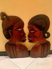 Coppia di teste etniche in legno