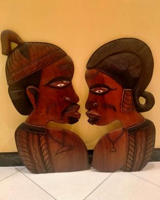 Coppia di teste etniche in legno