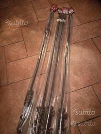 Bacchette in legno per tendine