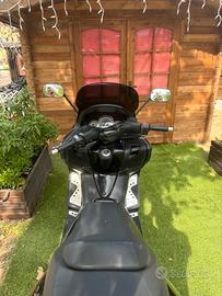 T max