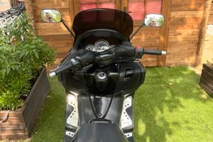 T max