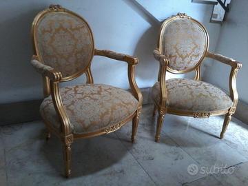 Due Antiche Poltrone dorate