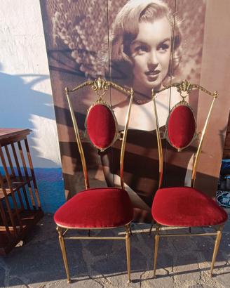 coppia di sedie in ottone