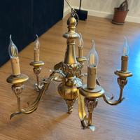 Lampadario dorato cinque luci