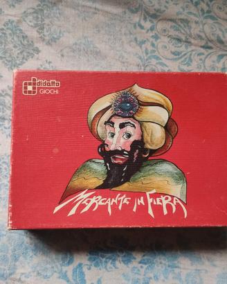 Mercante in fiera
- Gioco di carte