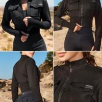 Giacca nera corta in vita con tasche e zip