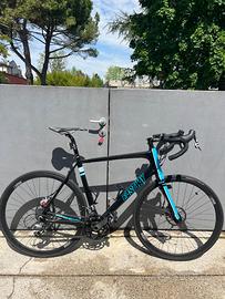 Bici da corsa in carbonio + tuta e scarpe