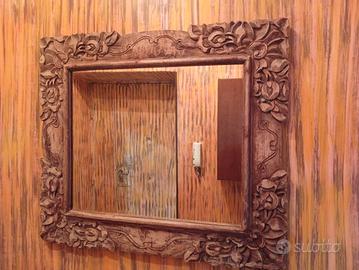 specchio lavorato a mano