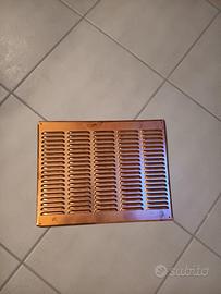 Griglia areazione in rame.