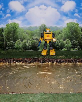 Diorama Transformers Lago Dorato scala Masterpiece