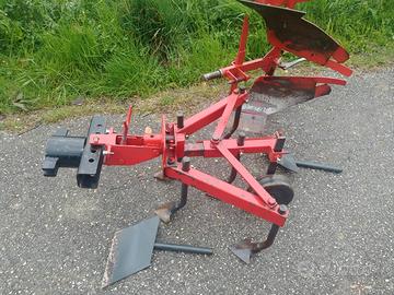 Erpice e aratro voltaorecchio