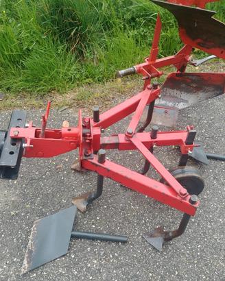 Erpice e aratro voltaorecchio